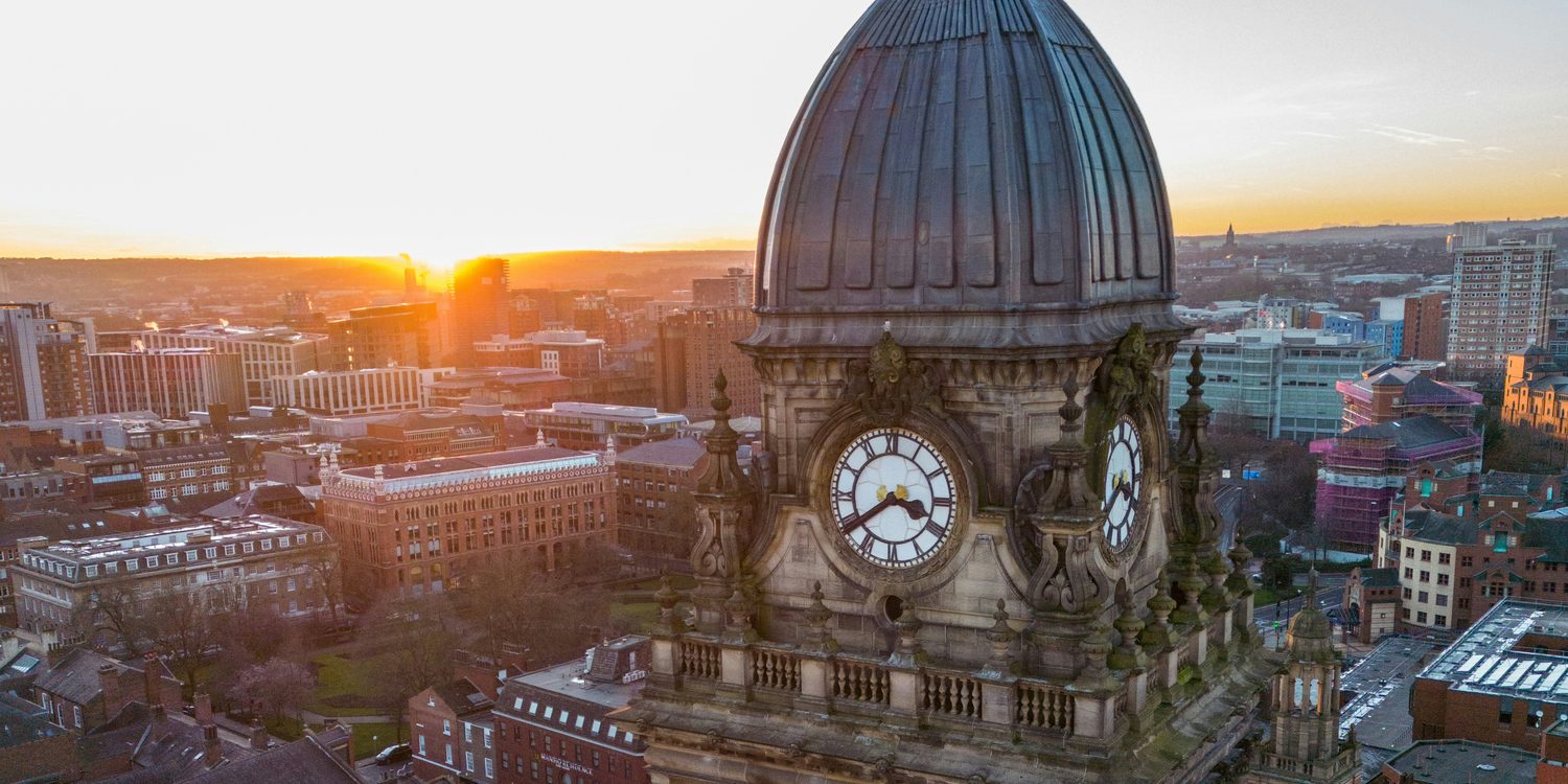 Leeds Town Hall clock tower at sunset